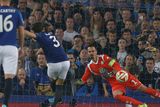 thumbnail: Everton's Leighton Baines scores his team's third goal from a penalty past VfL Wolfsburg's Diego Benaglio. Photo credit: REUTERS/Andrew Yates