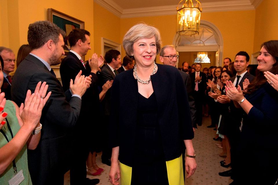 Staff clap as new Prime Minister Theresa May walks into 10 Downing Street, London, after meeting Queen Elizabeth II and accepting her invitation to become Prime Minister and form a new government Credit: Stefan Rousseau/PA Wire