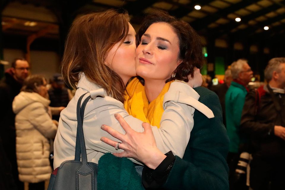 Fine Gael's Kate O'Connell is embraced by her sister Theresa Newman after she lost her seat in Dublin Bay South, as ballots are counted at the RDS in Dublin during the Irish General Election count Niall Carson/PA Wire