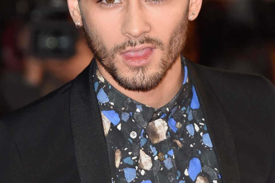 One Direction member Zayn" Malik attends the NRJ Music Awards at Palais des Festivals on December 13, 2014 in Cannes, France.  (Photo by Pascal Le Segretain/Getty Images)