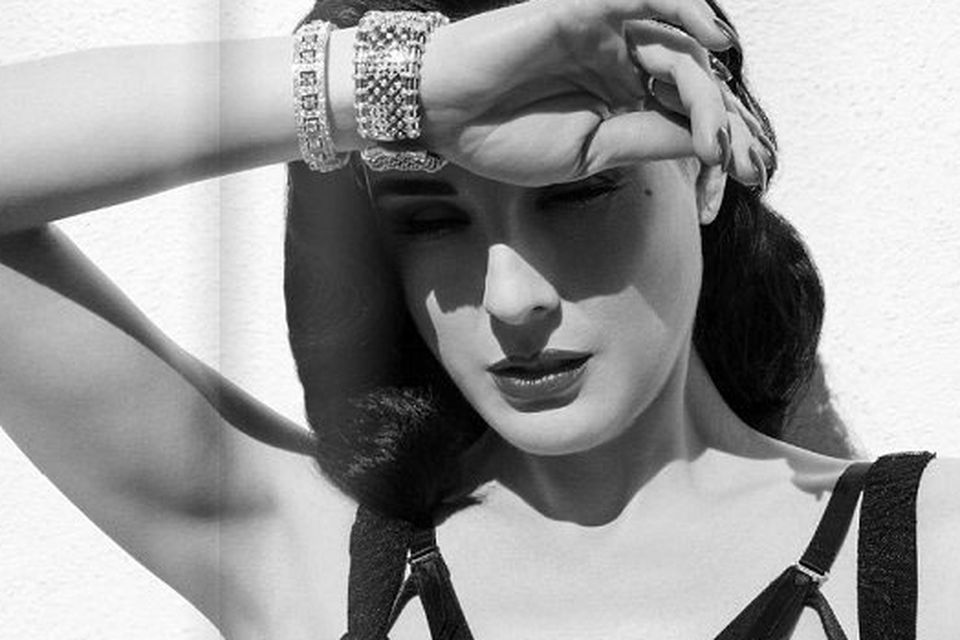 Dita Von Teese is credited internationally with reviving burlesque and  setting a new benchmark. — PhotoBook Magazine