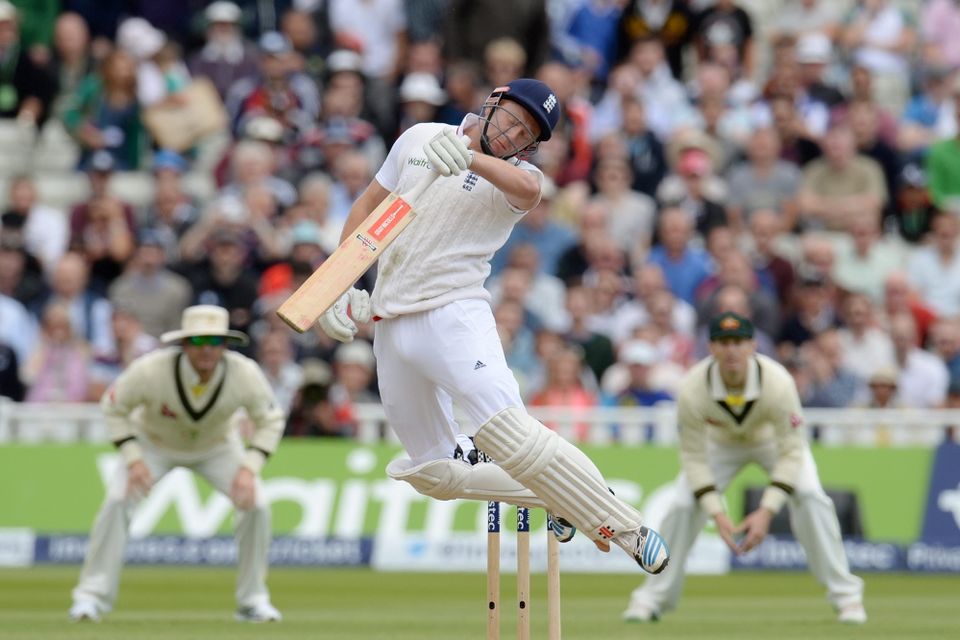 England’s Jonny Bairstow gloves a delivery from Mitchell Johnson and is caught by wicketkeeper Peter Nevill during day two of the 3rd Test match