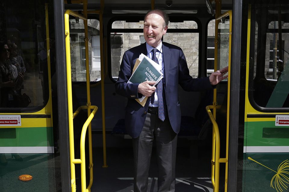 On the buses: Transport Minister Shane Ross arrives on a hybrid Dublin bus for the launch of the Climate Action Plan. Photo: Damien Eagers/INM