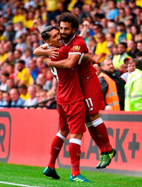 Liverpool's Mohamed Salah with Roberto Firmino