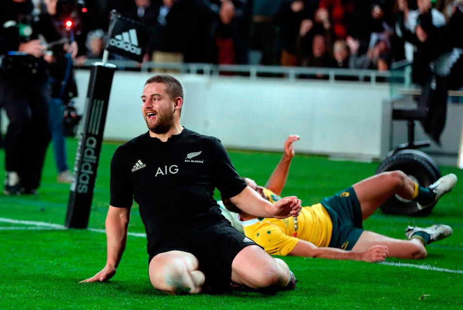 New Zealand's Dane Coles slides in for a try during the third