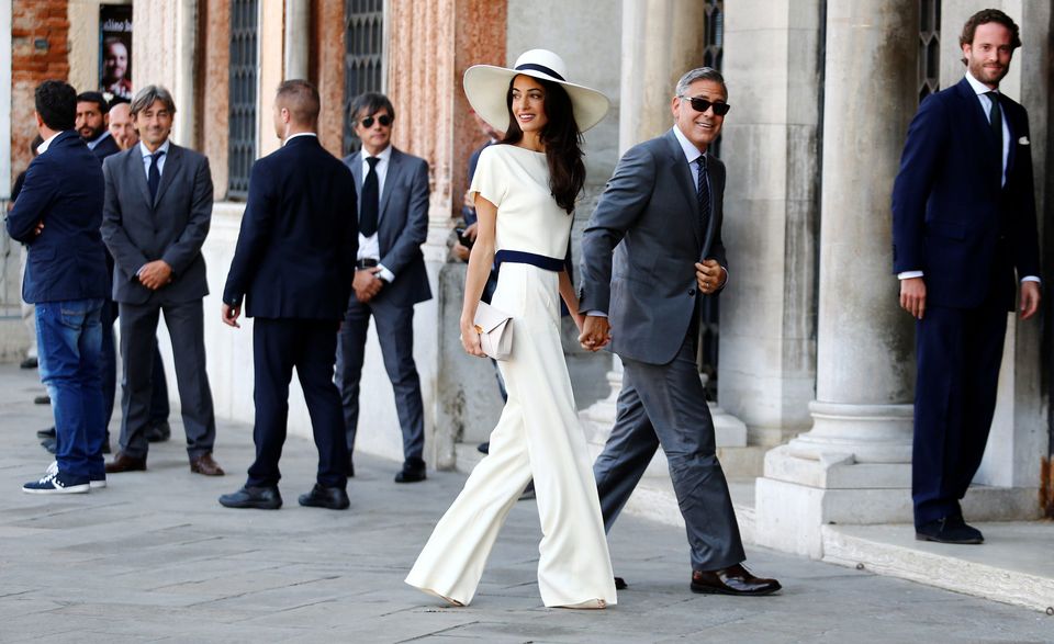 8: Amal Alamuddin, in a cream Stella McCartney suit, pictured with George Clooney.