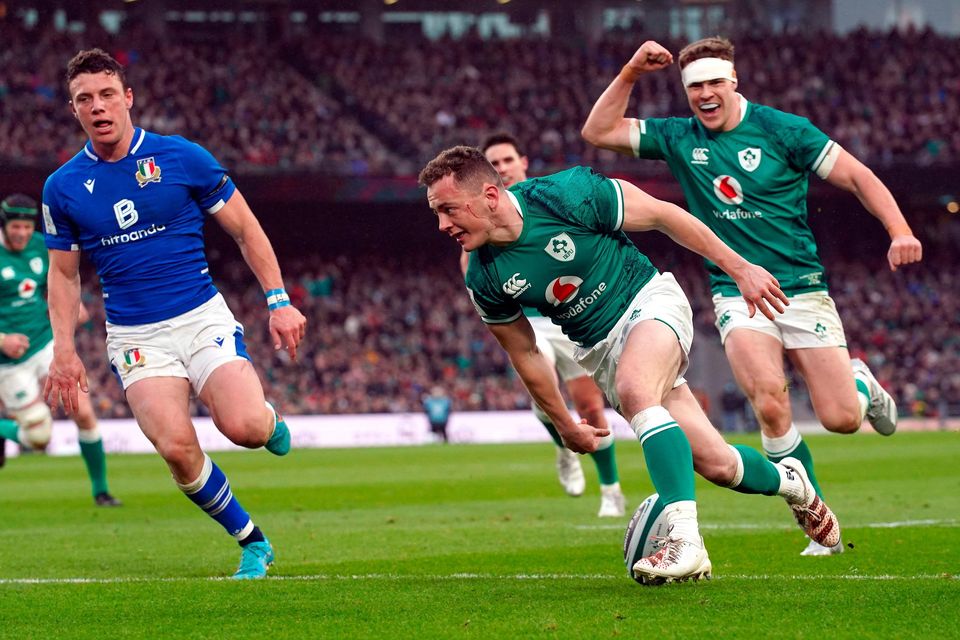 Ireland's Michael Lowry runs in to score their side's third try as Garry Ringrose (right) celebrates. Photo credit: Brian Lawless/PA Wire.