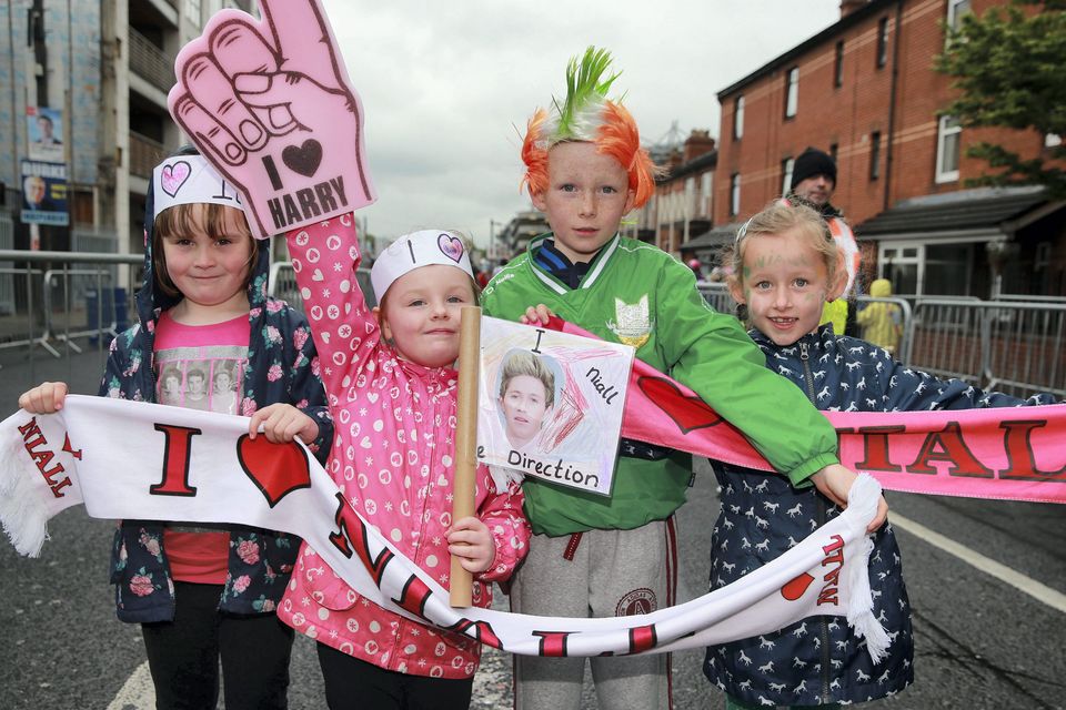 One Direction fans Stephanie Harris, age 6, Emma Harris, 4, Scot Carroll, 9, and Lucy Carroll, 6, from Kildare, on their way to see the band at Croke Park, Dublin.. Picture:Arthur Carron