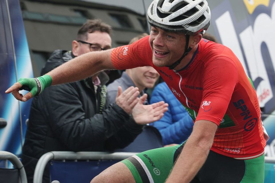 Dillon Corkery crosses the line, clearly delighted at winning the 2023 Rás Tailteann.