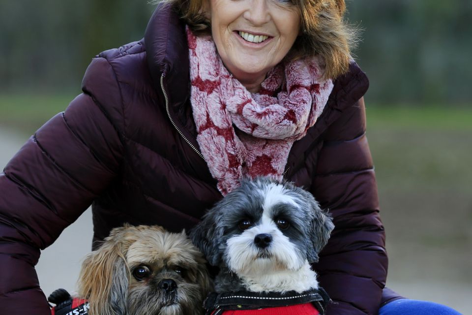Terry O'Reilly with her dogs Poppy and Lily. Photo: Gerry Mooney