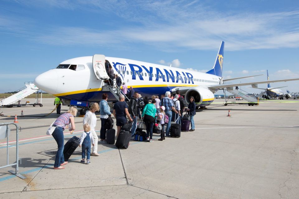 Frankfurt-Hahn Airport. Passengers board a Ryanair passenger plane. Photo by Ulrich Baumgarrten via Getty Images