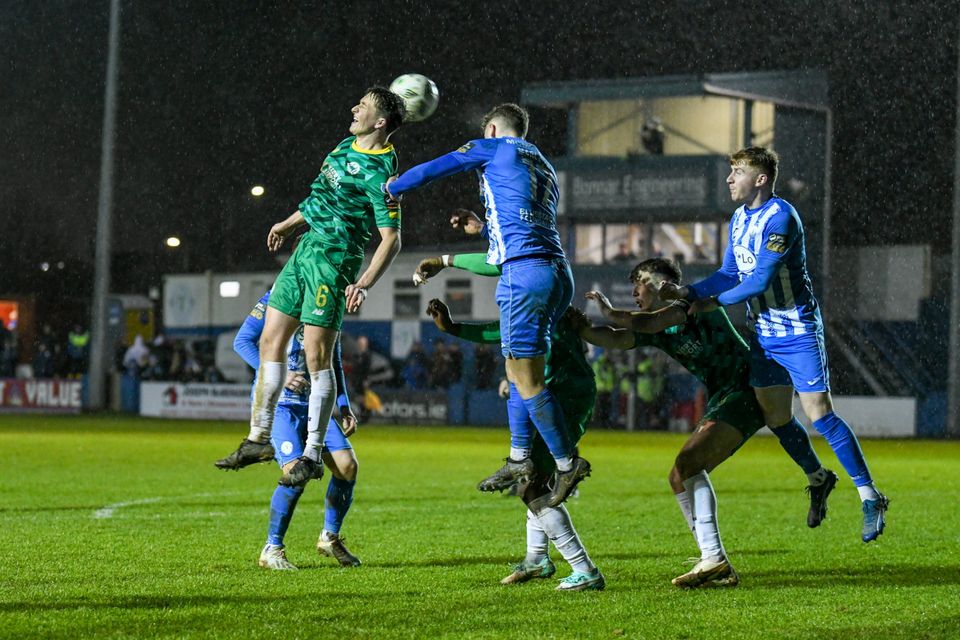 Kerry FC defender Ethan Kos gets his head to the ball ahead of a couple of Finn Harps players during their First Division game in Finn Park, Ballybofey. Photo by Adam Kowalczyk