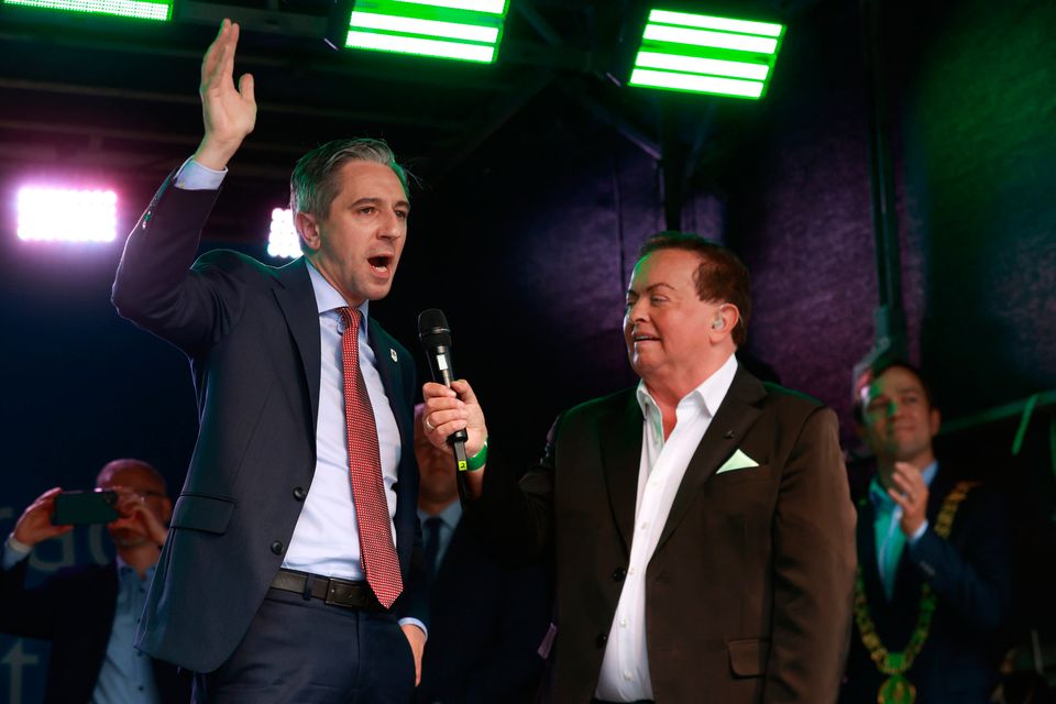 Taoiseach Simon Harris is interviewed by Marty Morrissey on O'Connell Street in Dublin. Photo: PA