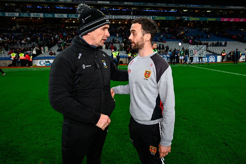 Westmeath manager Dessie Dolan, left, and Down manager Conor Laverty after the Allianz Football League Division 3 final at Croke Park. Photo by Ramsey Cardy/Sportsfile