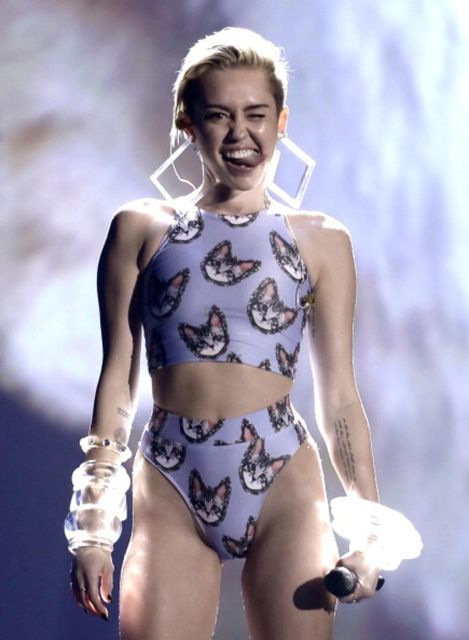 Miley Cyrus performs onstage during the 2013 American Music Awards