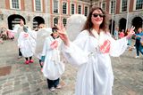 thumbnail: Women dressed as an angels celebrate at Dublin Castle: Niall Carson/PA Wire