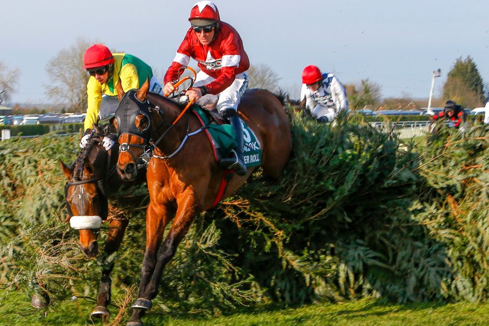 Tiger Roll, with Davy Russell on board, on the way to winning The Randox Health Grand National Handicap Chase at Aintree last April
