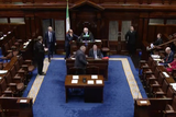 thumbnail: 1. Clare TD Timmy Dooley walks into the Dáil Chamber