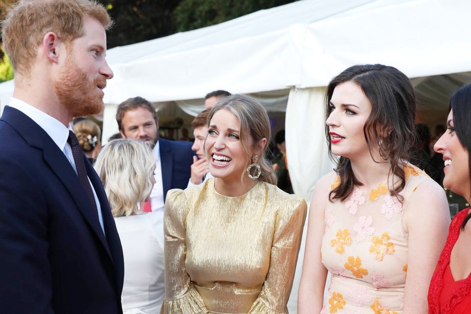 Party chat: Britain’s Prince Harry with Amy Huberman and Aisling Bea at Glencairn, the British ambassador’s residence