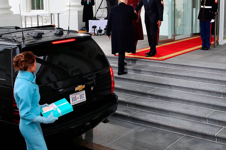 President-elect Donald Trump (C),and his wife Melania Trump (L), are greeted by President Barack Obama (R), and his wife first lady Michelle Obama, upon arriving at the White House on January 20, 2017 in Washington, DC. Later in the morning President-elect Trump will be sworn in as the nation's 45th president during an inaugural ceremony at the U.S. Capitol.  (Photo by Mark Wilson/Getty Images)