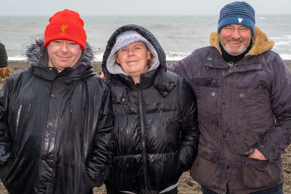 Glen Kelly, Ann Marie Kelly and Alan Bryan at the Festina Lente Charity Swim in Greystones. Photo: Leigh Anderson