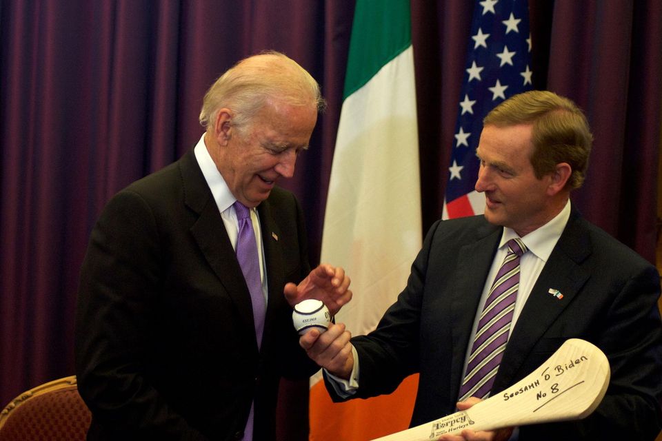 Joe Biden received a hurl as welcome gift from then-Taoiseach Enda Kenny during a visit in 2016. Photo: Getty