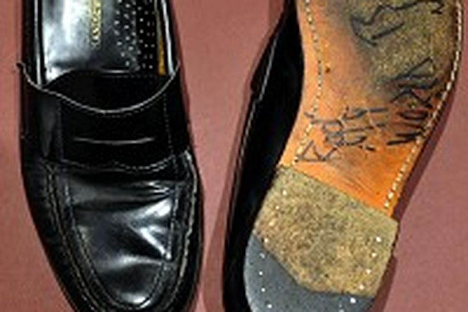 Michael Jackson's black loafers that he moonwalked in up for