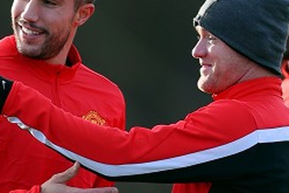 Robin Van Persie, left, and Wayne Rooney, right, are both carrying injuries