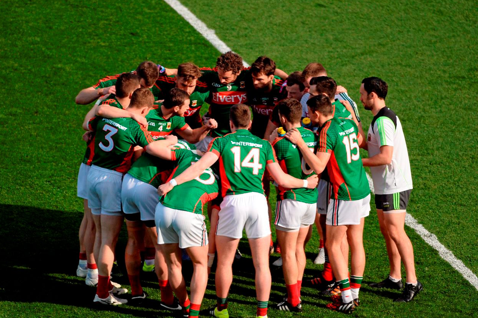 Mayo captain Keith Higgins speaks to his team before the Dublin game