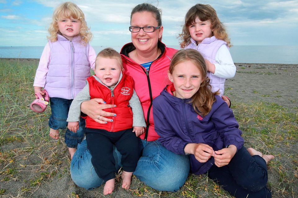 Twins Siobhan and Emma (2), Brian (7 months) and Rachel (8) with mum Becky Dore. Photo: Frank Mc Grath.
