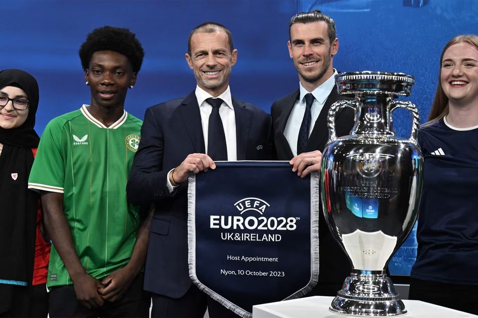 Gareth Bale of the UK and Ireland squad, UEFA president Alexander Ceferin and fans.Photo: Associated Press