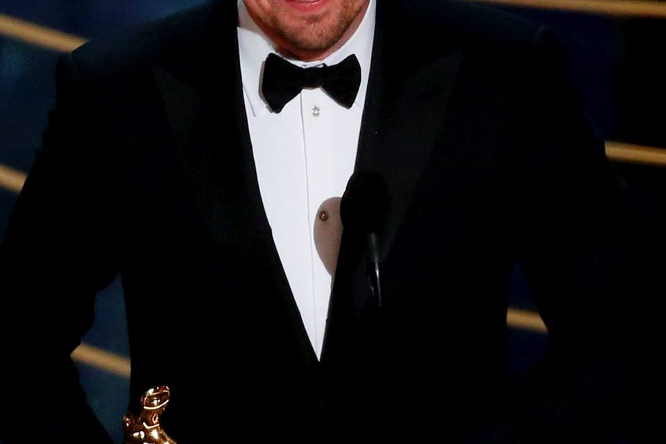 Leonardo DiCaprio accepts the Oscar for Best Actor for the movie "The Revenant" at the 88th Academy Awards
