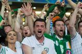 thumbnail: Robbie Brady's girlfriend Kerrie Harris (left) and brother (centre) show their emotions at full time against Italy