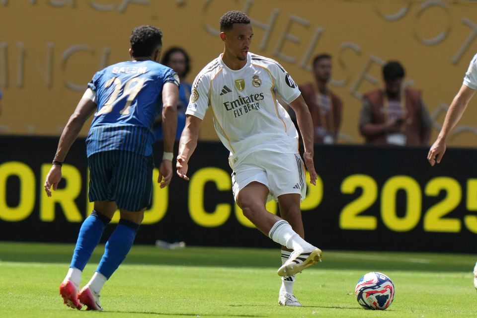 Real Madrid's Trent Alexander-Arnold, right, passes the ball during the Club World Cup Group H draw with Al Hilal in Miami, Florida