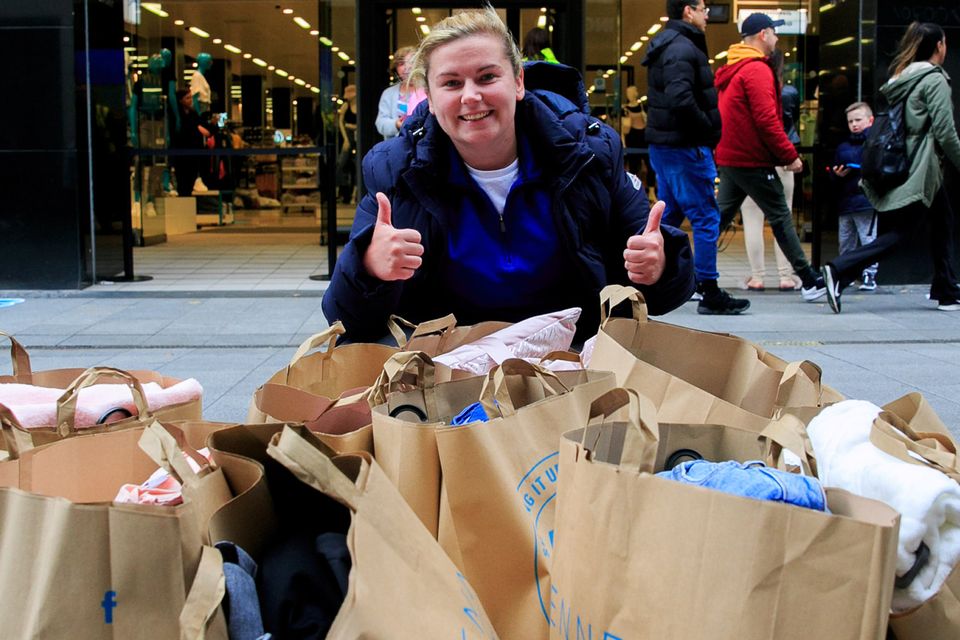 Niamh Hennessy, from Finglas, gives the thumbs-up after her shopping spree.