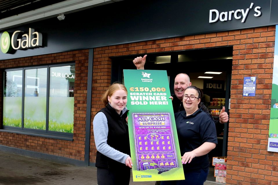 Staff at Darcy’s Filling Station in Mountlucas, Daingean, County Offaly were delighted to hear that their store sold an All Cash Surprise scratch card with a top prize amount worth €150,000. Pictured at the celebrations were Grace Kelly, Tom Darcy and Sharon Bracken at Darcy's Gala service station Mount Lucas, Co. Offaly. Pic: Paul Molloy / Mac Innes Photography