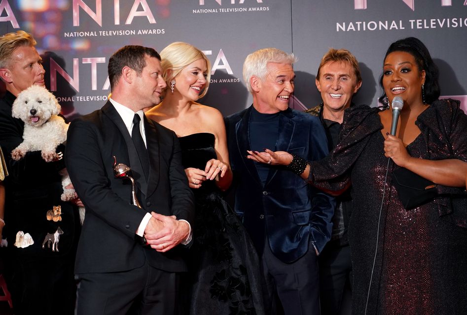 Dermot O’Leary, Holly Willoughby, Phillip Schofield, Nik Speakman and Alison Hammond celebrate in the press room after winning the Daytime award for This Morning at the National Television Awards 2022 held at the OVO Arena Wembley in London (Ian West/PA)