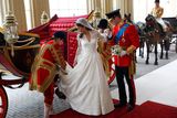 thumbnail: Prince William (right) helping his bride Kate leave the 1902 State Landau as they arrive at Buckingham Palace in central London after their wedding. Andrew Winning/PA Wire