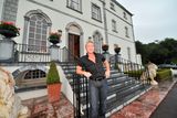 thumbnail: Michael Flatley on the front steps of his Castlehyde home.