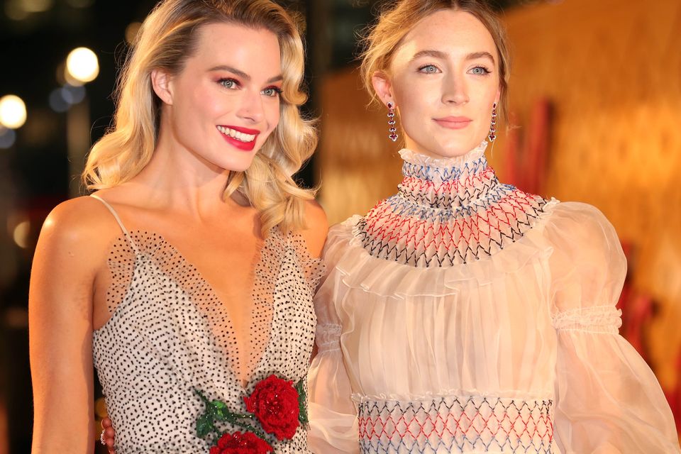 Margot Robbie (left) and Saoirse Ronan at the premiere for Mary Queen of Scots (Isabel Infantes/PA)