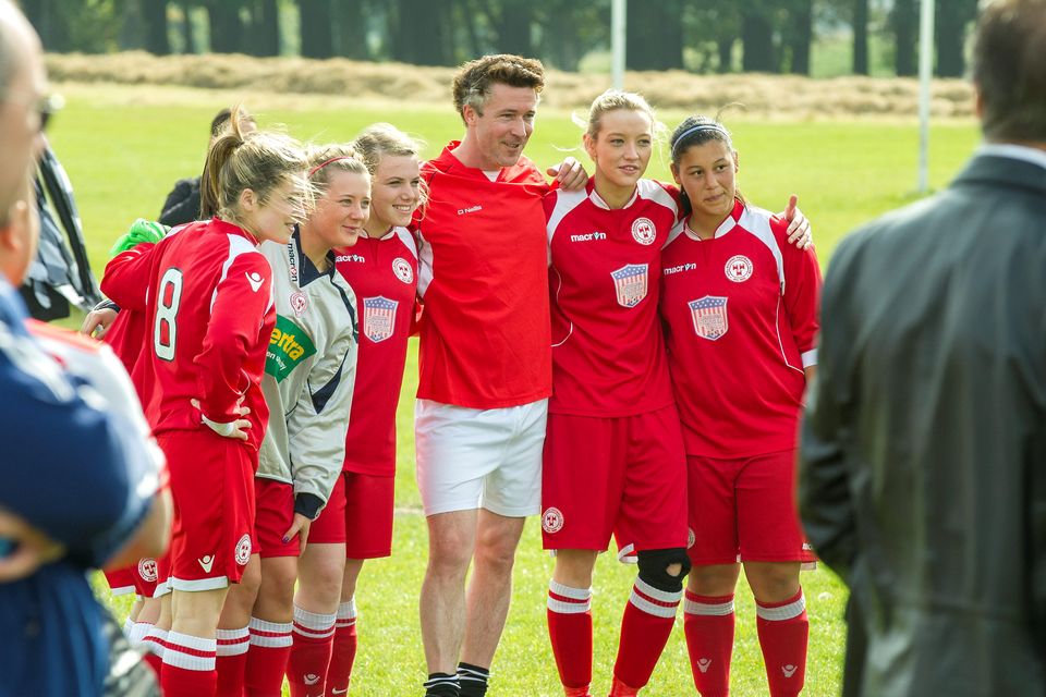 Sunday 14 September 2014. Phoenix Park: Sport Against Racism Ireland (SARI) organised a Sari All-Stars v Love/Hate cast football match. Aiden Gillen poses with a team of young women.