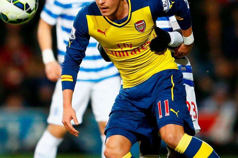 Mesut Ozil in action against QPR during Arsenal’s victory at Loftus Road