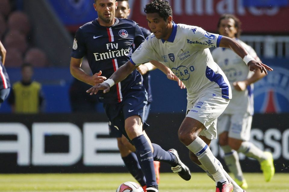 Bastia forward Brandao vies with Paris Saint-Germain's Thiago Motta during the French Ligue 1 game at the Parc des Princes in Paris. PSG were left fuming after Motta was left with a fractured nose following a bust-up in the tunnel at the end of the match. Photo: THOMAS SAMSON/AFP/Getty Images