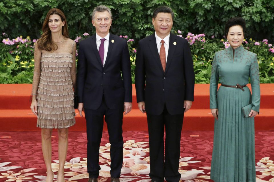 Chinese President Xi Jinping and wife Peng Liyuan welcome Argentine President Mauricio Macri and his wife Juliana Awada at the welcoming banquet for the Belt and Road Forum on May 13, 2017 in Beijing, China. (Photo by Jason Lee - Pool/Getty Images)