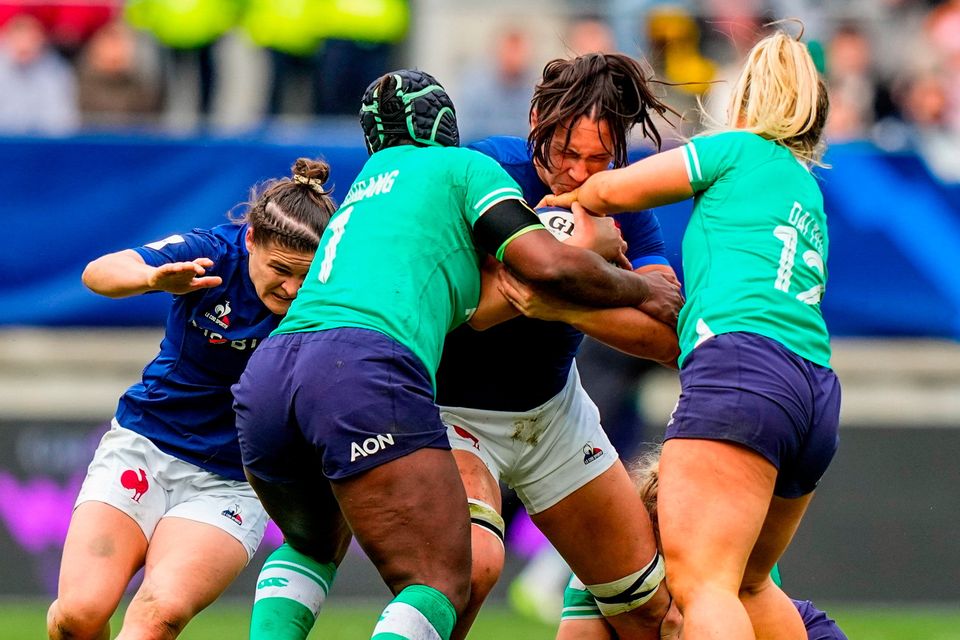Manaé Feleu of France is tackled by Linda Djougang, left, and Aoife Dalton of Ireland during the Women's Six Nations match at Stade Marie-Marvingt in Le Mans, France. Photo by Hugo Pfeiffer/Sportsfile