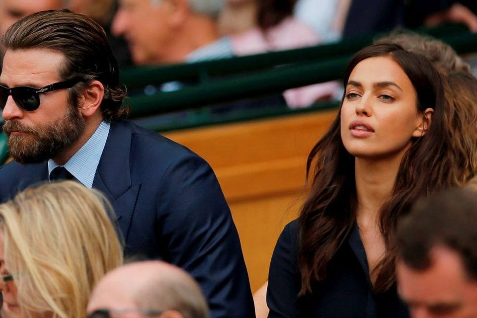 Actor Bradley Cooper and his girlfriend model Irina Shayk in the royal box on centre court at Wimbledon