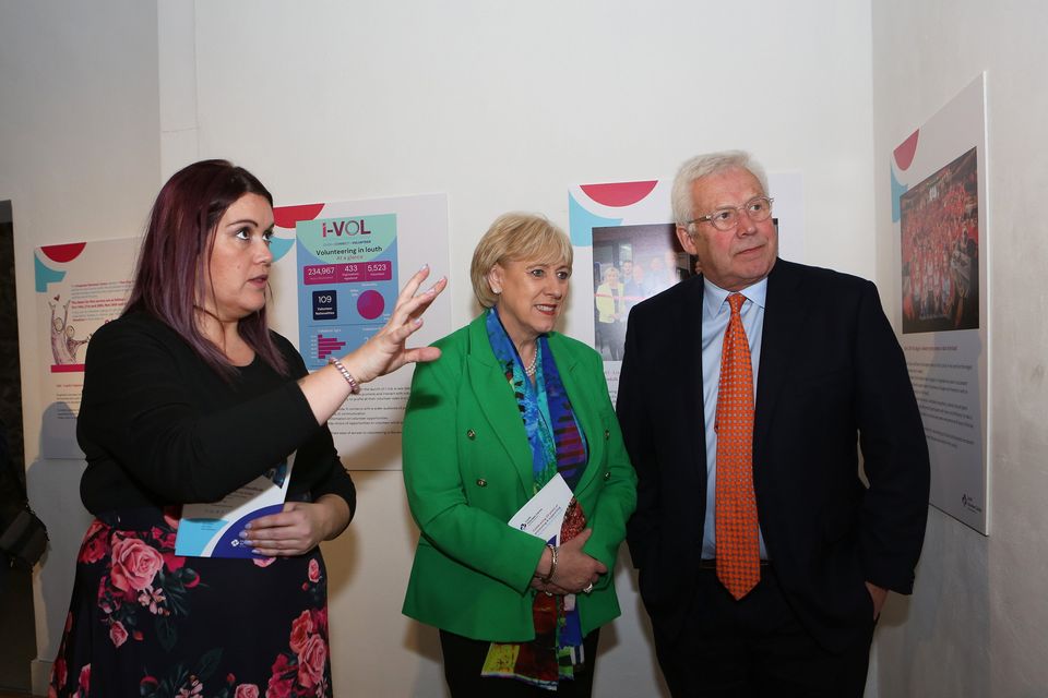 Manager of Louth Volunteer Centre Kayleigh Mulligan shows Minster Heather Humphries and Fergus O’Dowd, TD around the exhibition at the Louth Volunteer Centre’s 20th Anniversary at Highlanes Gallery, Drogheda.