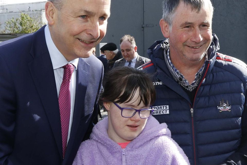 Tanaiste Micéal Martin with Ciara and Eamon McCarthy in Charleville at the opening of the Peter McVerry Trust social housing facility in the old CBS Building.last Friday.