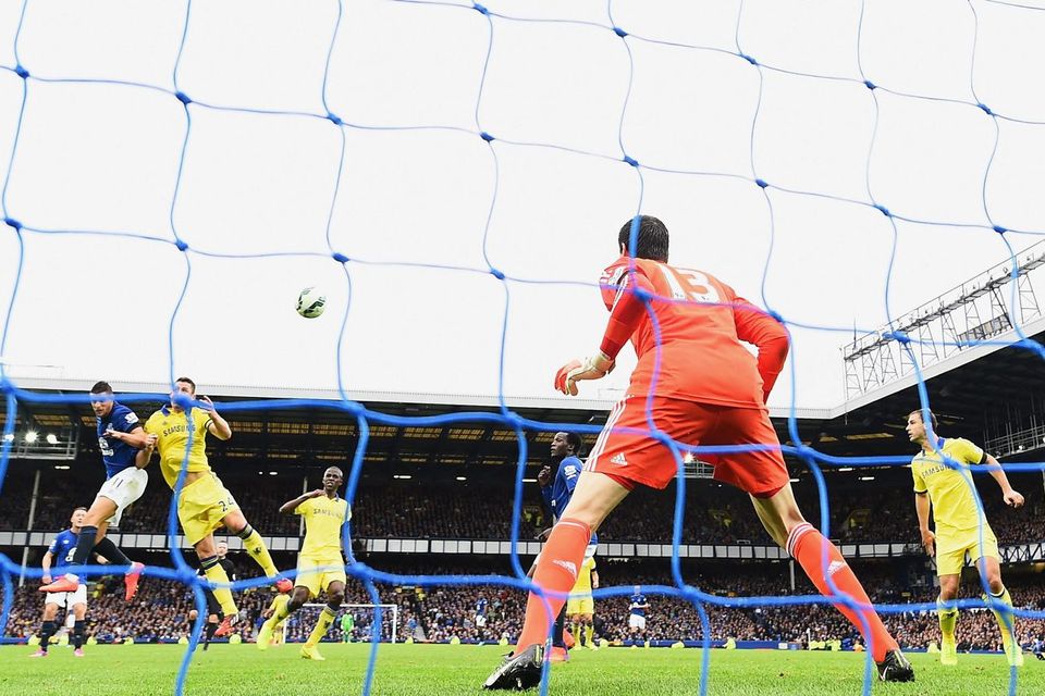 Kevin Mirallas of Everton scores with a header against Chelsea