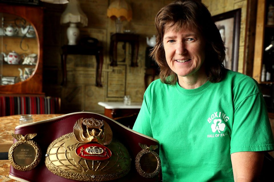 World champion boxer Deirdre Gogarty proudly shows off her belt.